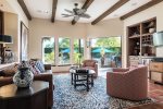 Family Room Features Wine Bar And Opens To Pool Area